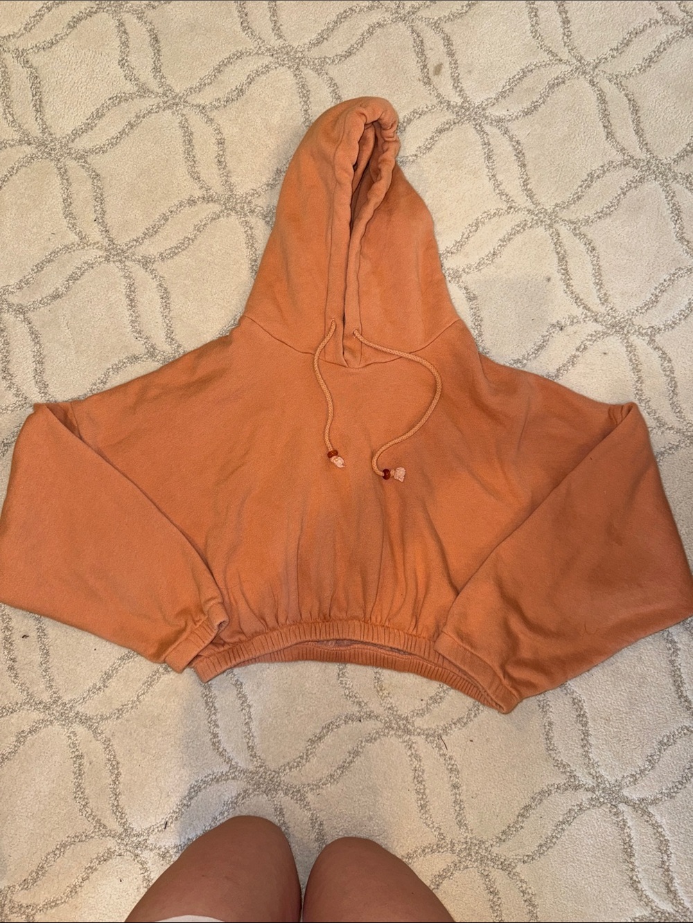 DONNI. Cropped Hooded Sweatshirt in Burnt Orange